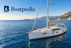 Boatpedia sailboat cover on a sunlit sea