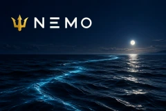 Nemo gold trident and wordmark over a moonlit ocean